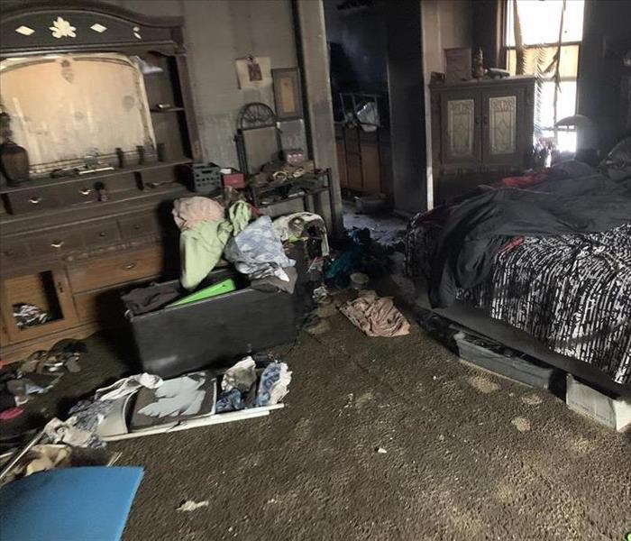 master bedroom with furniture burned